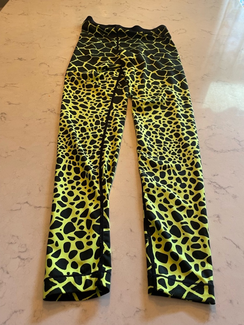 Nike Yellow and Black Animal Print Leggings. Item # 11459